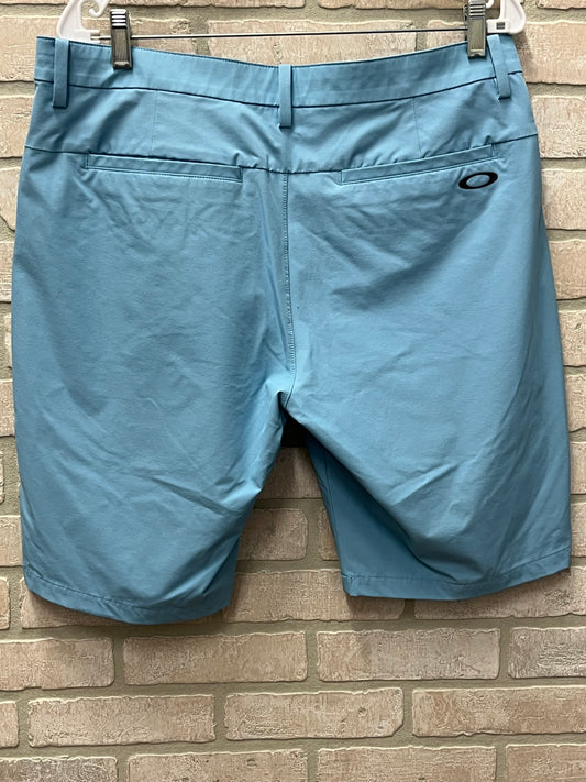 Oakley golf shorts relax fit sky blue size 34 inseam 9.5