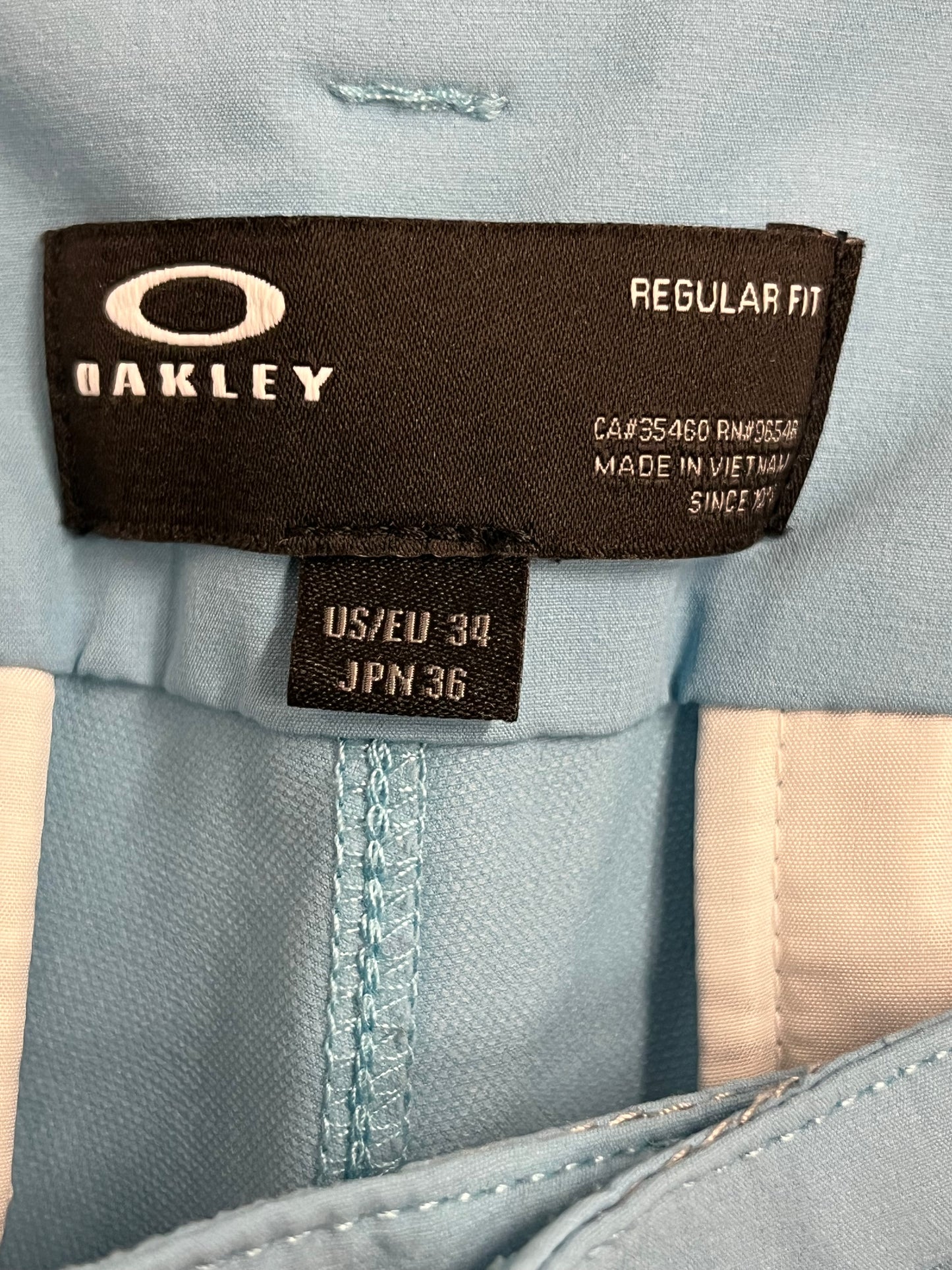 Oakley golf shorts relax fit sky blue size 34 inseam 9.5