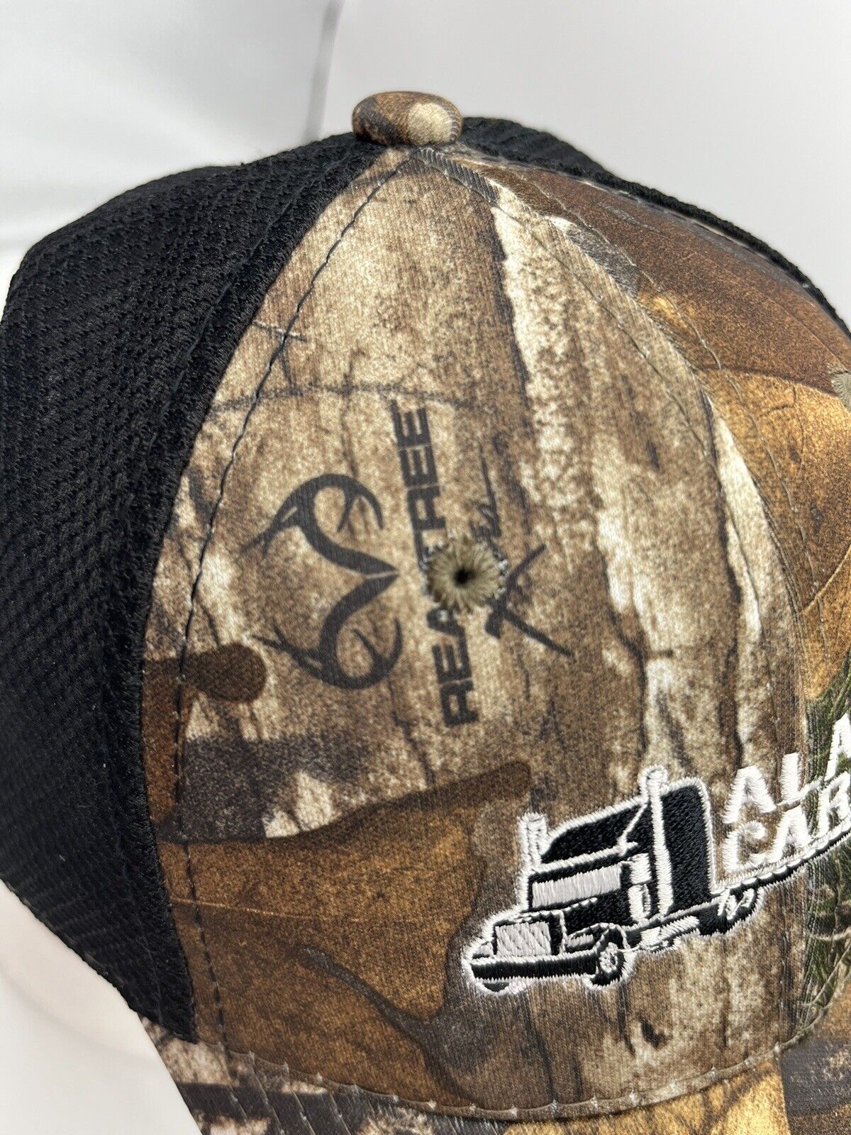 Real tree camouflage trucker hat adjustable logo Alabama carriers